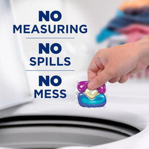 Hand placing Arm & Hammer Plus OxiClean Power Pak into washing machine with no spills