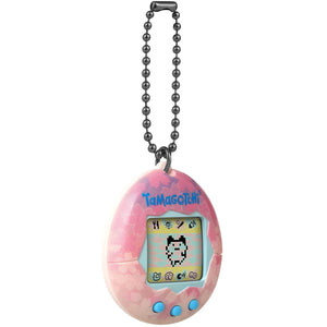 BANDAI Original Tamagotchi Sakura Gen 1 device with digital pet on screen