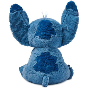 Back view of Disney Store Stitch medium plush toy showing soft fuzzy fabric and embroidered details.