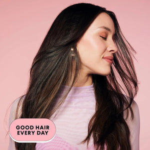 Model with smooth shiny hair after using MONDAY Haircare Smooth shampoo and conditioner
