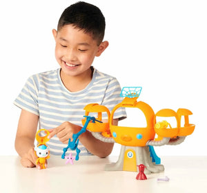 Child playing with Octonauts Octopod playset including Captain Barnacles figure and accessories.
