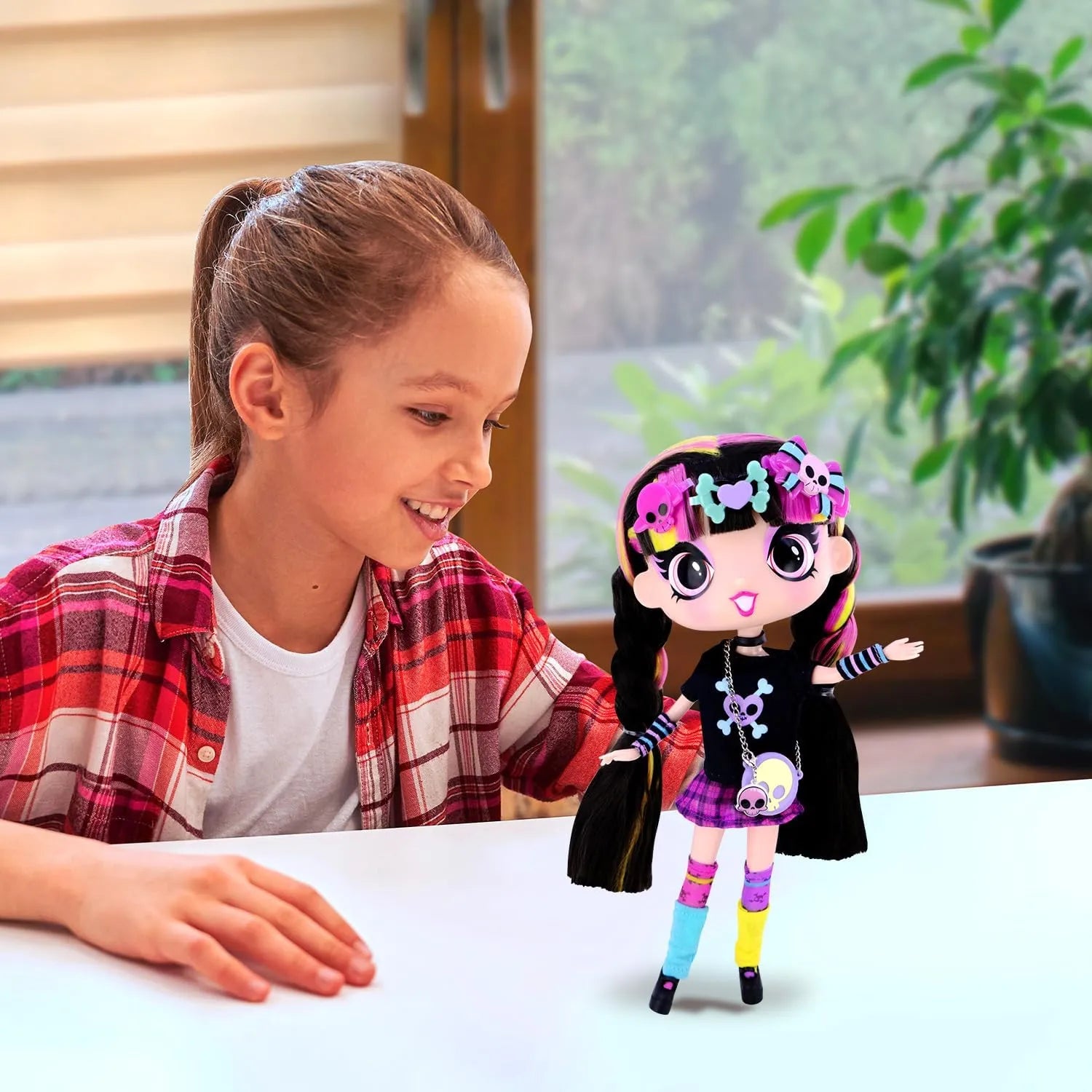 Child playing with Decora Fashion Girlz Luna 11 inch fashion doll on table