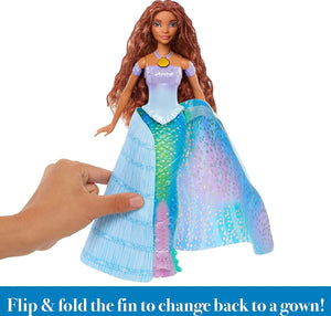 Disney Princess Ariel transforming doll showing flip skirt feature changing from gown to mermaid tail.