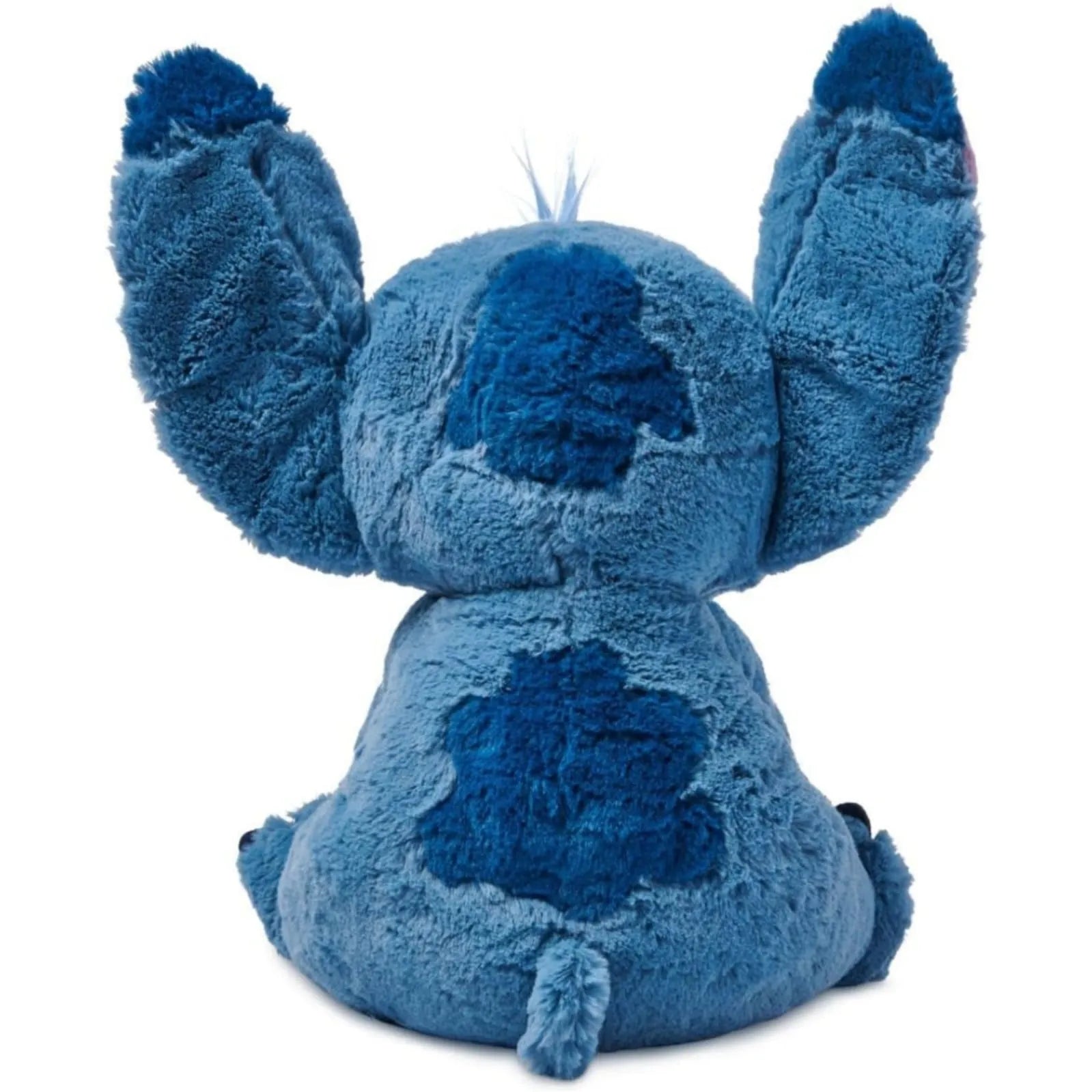 Back view of Disney Store Stitch medium plush toy showing soft fuzzy fabric and embroidered details.