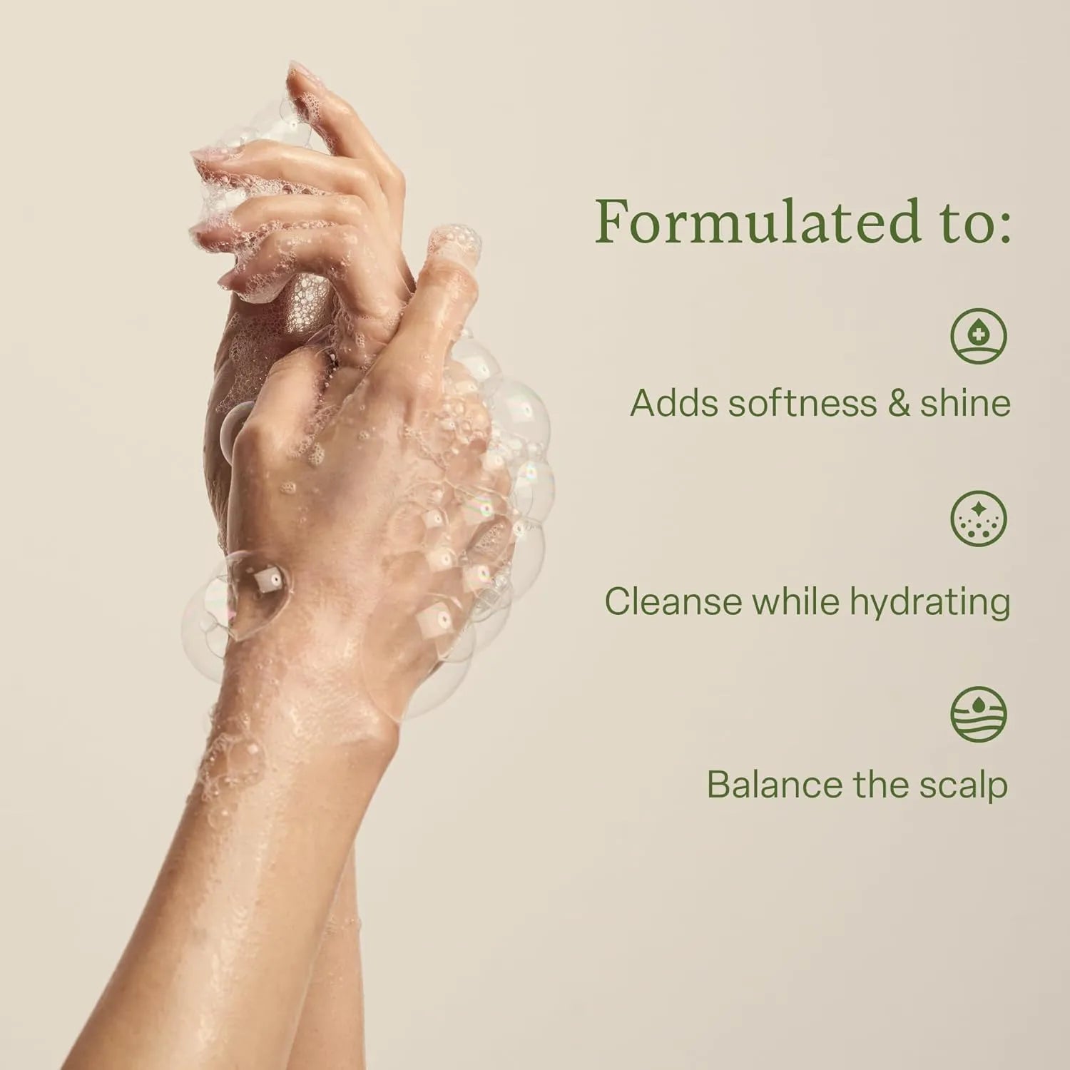 Hands covered in shampoo lather demonstrating Divi Hydrating Shampoo formulated to add softness, shine, cleanse while hydrating, and balance the scalp.