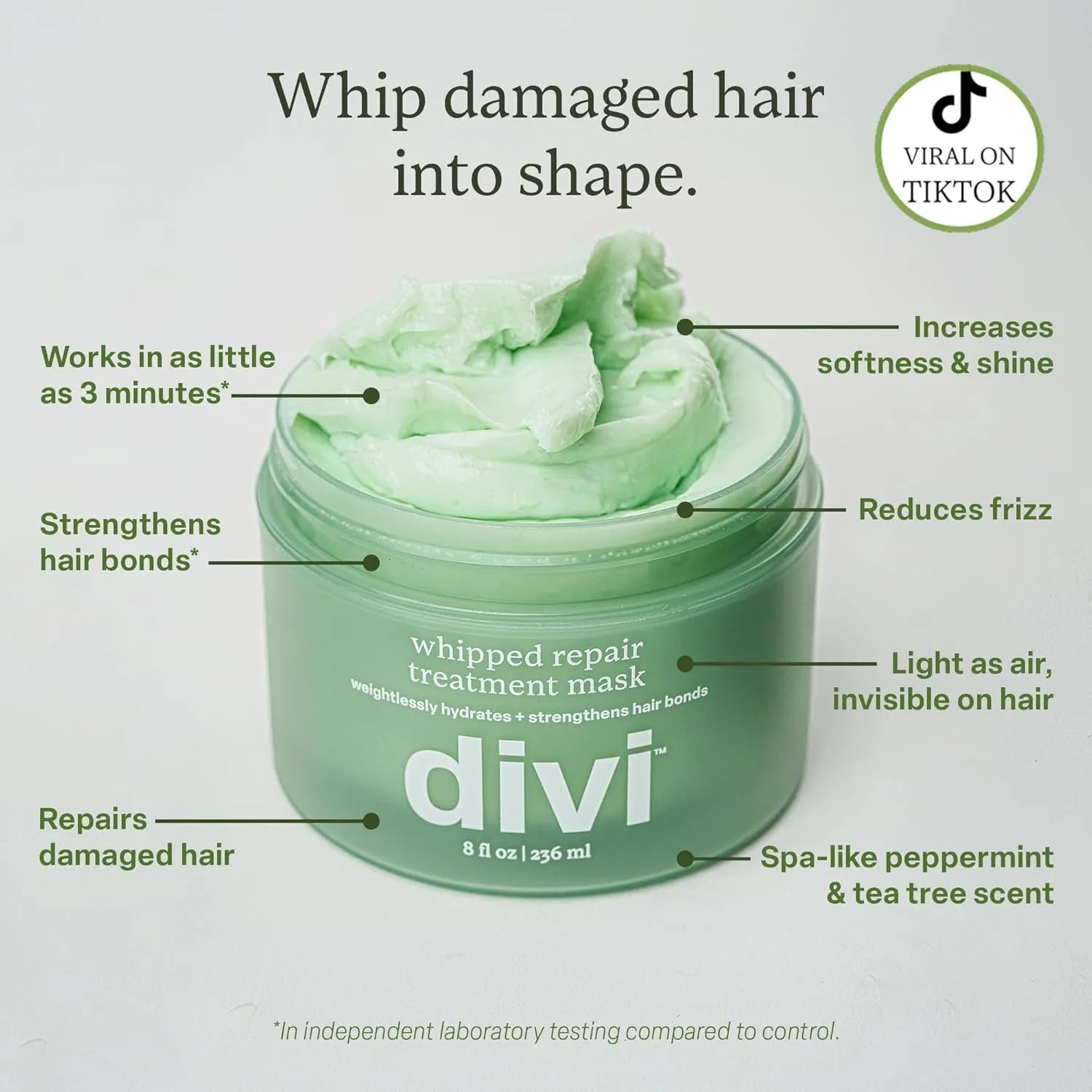 Green jar of divi whipped repair treatment mask with text highlighting features on a light gray background