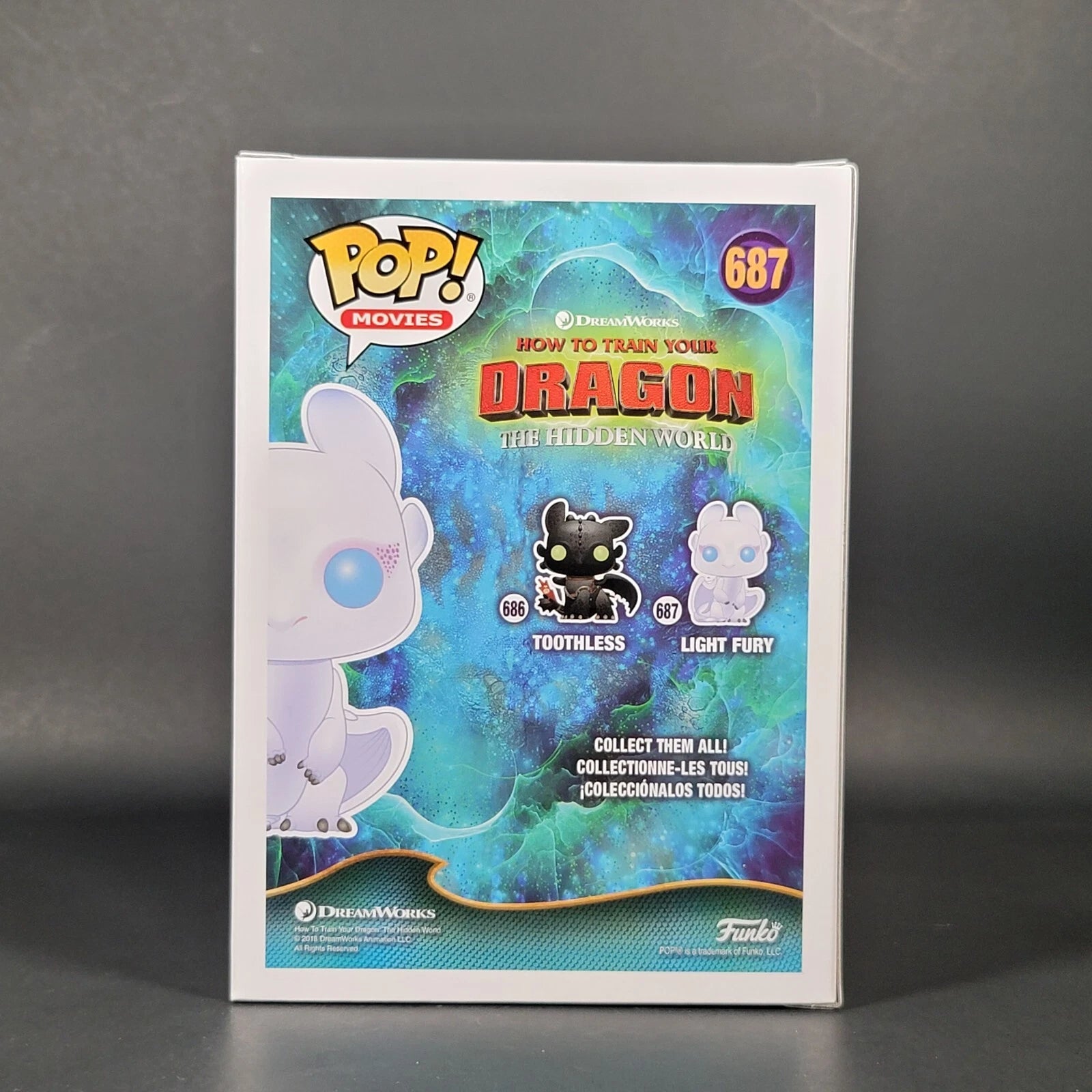 Funko Pop Movies Light Fury #687 back of box from How to Train Your Dragon The Hidden World showing Toothless and Light Fury collection details