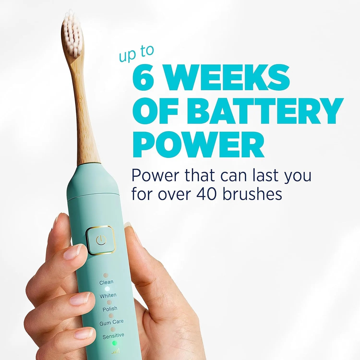 Hand holding Lumineux electric toothbrush with text indicating up to 6 weeks of battery power
