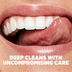 Close-up of smiling mouth with white teeth and text about deep cleaning care