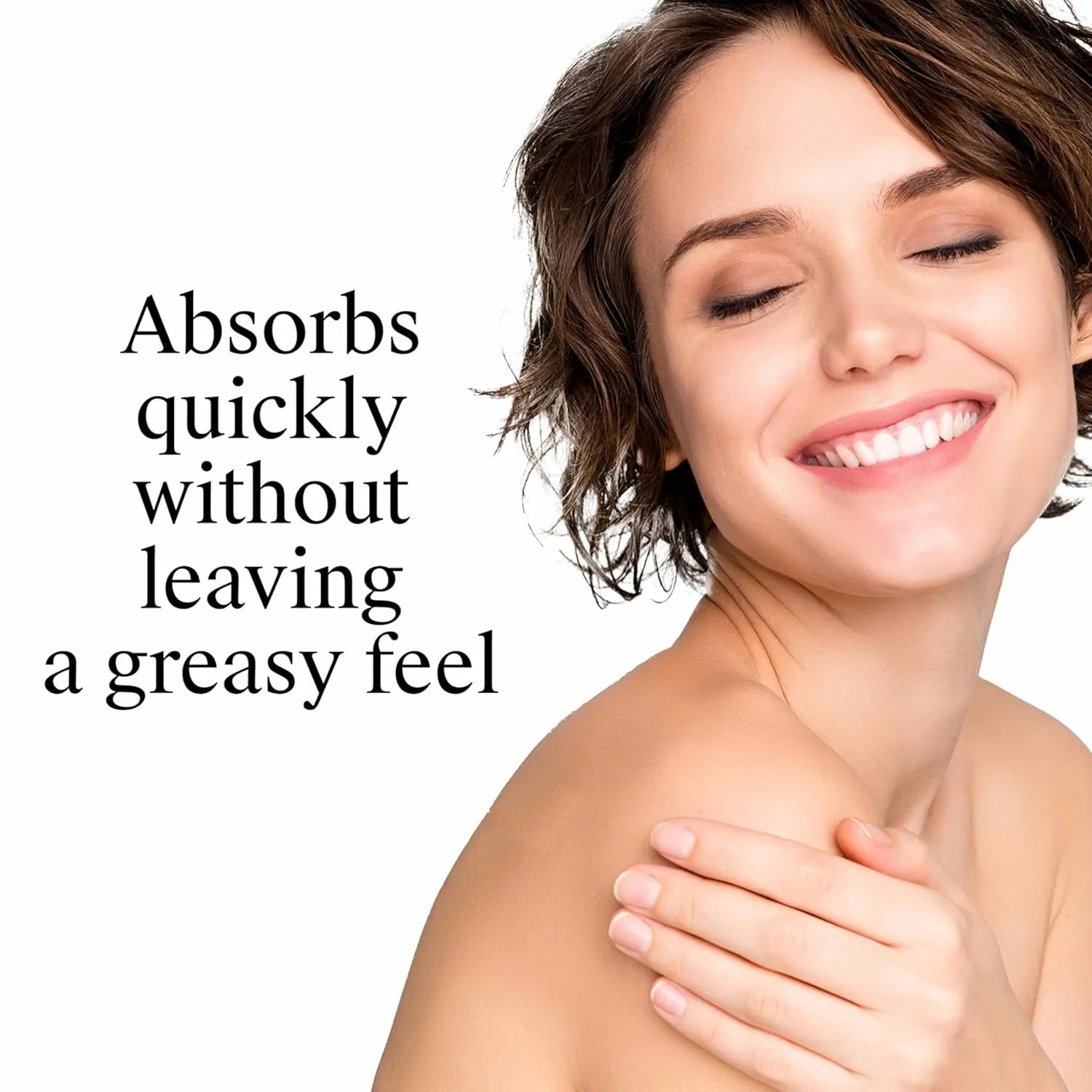 Woman applying Neutrogena Body Oil Light Sesame Formula to shoulder.