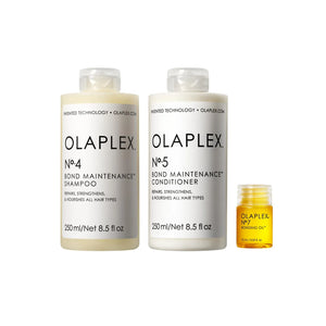 Olaplex No.4 Shampoo, No.5 Conditioner, and No.7 Bonding Oil displayed together.
