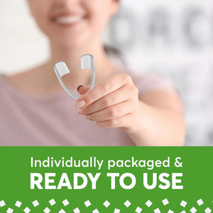 Person holding Plackers Grind No More disposable dental night guard ready to use