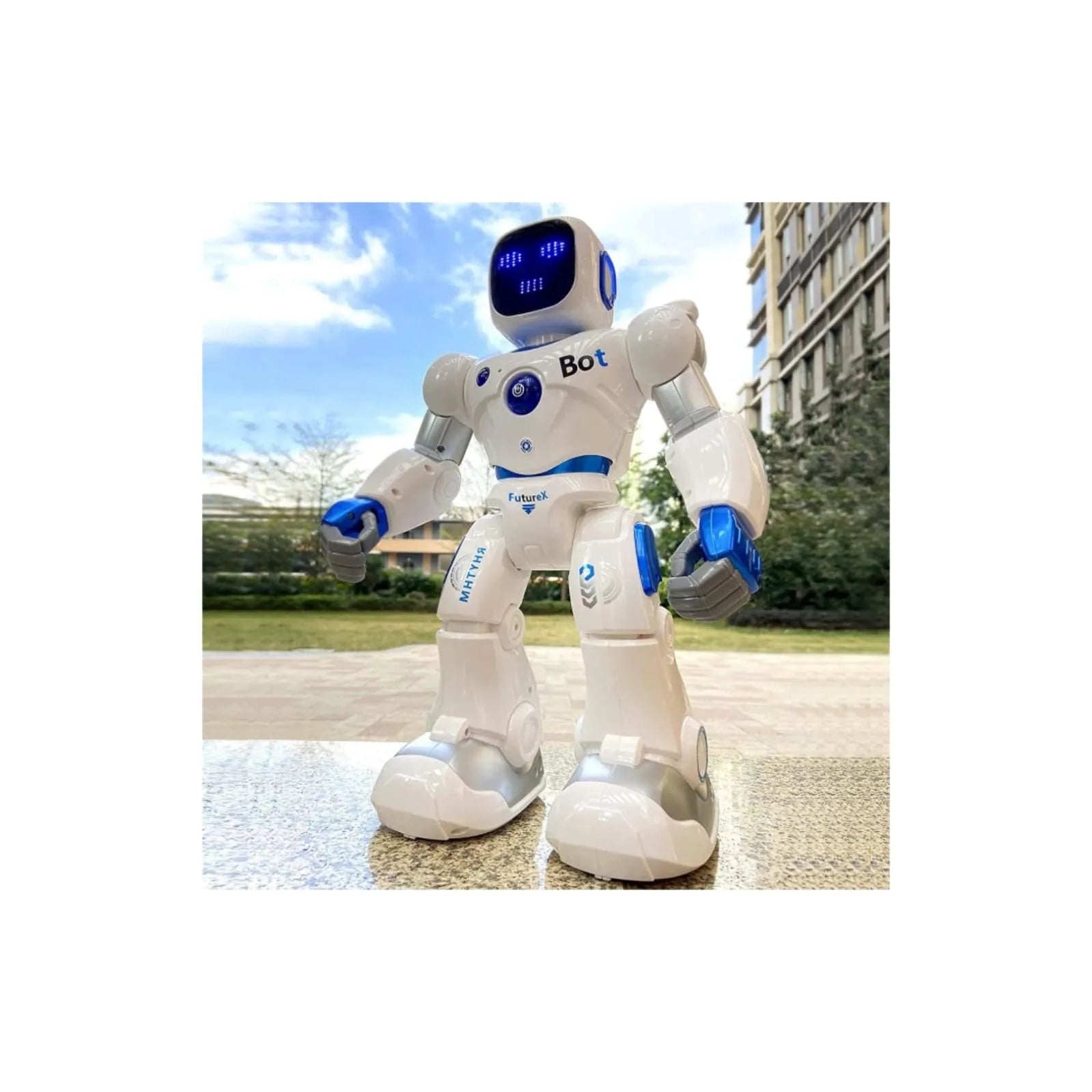 Ruko 1088 interactive programmable robot toy standing outdoors showing LED expressions and movable joints